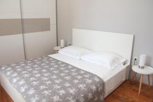 Postel nebo postele na pokoji v ubytování Apartman Cathedral