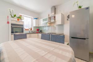 Kuchyňa alebo kuchynka v ubytovaní Apartments Coronata