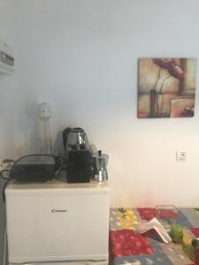 A kitchen or kitchenette at Studios Panorama Drios