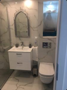 Kúpeľňa v ubytovaní Apartament Chanel Centrum