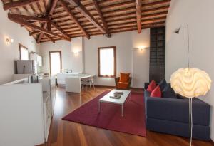 TV a/nebo společenská místnost v ubytování Villa Moro Lin Design Apartments