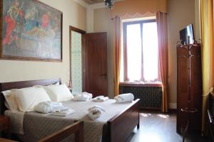 Posteľ alebo postele v izbe v ubytovaní Bed & Breakfast OttoQuadri