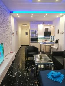 A kitchen or kitchenette at TOTANI LUX