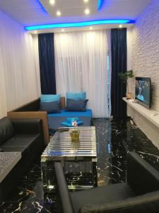 A television and/or entertainment centre at TOTANI LUX