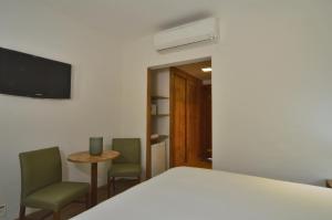 Μια τηλεόραση ή/και κέντρο ψυχαγωγίας στο Hotel Magique Le Canton