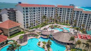 an aerial view of a resort with a swimming pool at Emporio Cancun - Optional All Inclusive in Cancún