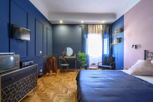 Posteľ alebo postele v izbe v ubytovaní GLAM 50 - Exlusive Penthouse in the Heart of Rome