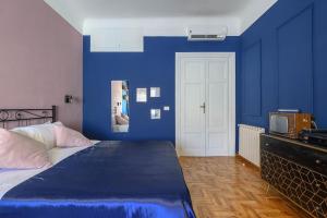 Posteľ alebo postele v izbe v ubytovaní GLAM 50 - Exlusive Penthouse in the Heart of Rome
