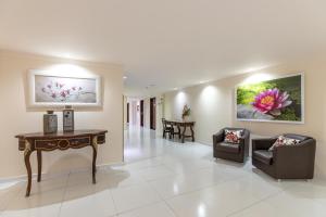 Uma área de estar em Bogari Hotel