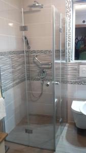Kúpeľňa v ubytovaní Luxury apartment by the sea with private whirlpool and terrace 50m2