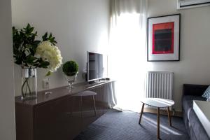 TV o dispositivi per l'intrattenimento presso The Corner Suite in Historical Center