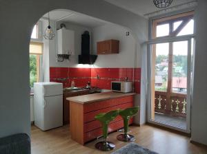 Nhà bếp/bếp nhỏ tại Przy Leśnej