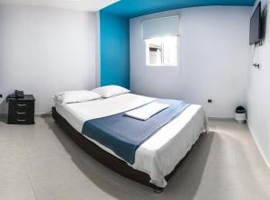 Krevet ili kreveti u jedinici u okviru objekta Hotel Oviedo Real