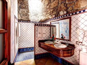 
a bathroom with a sink and a mirror at Hotel Rural San Miguel - Only Adults in San Miguel de Abona
