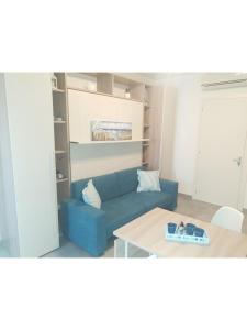 A seating area at Island Apartment Porto Cesareo