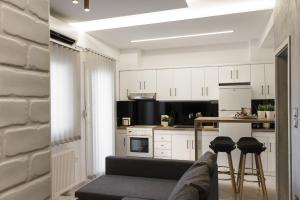 Η κουζίνα ή μικρή κουζίνα στο Thess home Now Luxury Apartment