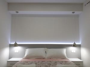 Posteľ alebo postele v izbe v ubytovaní Apartment Roso