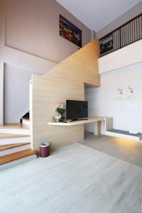TV a/nebo společenská místnost v ubytování Hatyai Signature Hotel