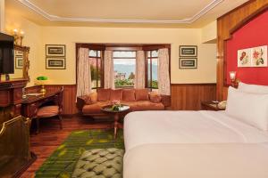 Postel nebo postele na pokoji v ubytování Mayfair Darjeeling + 37 fotografií