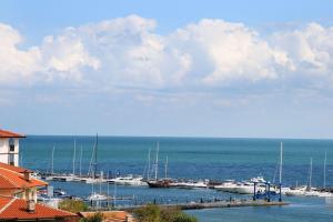 a group of boats docked at a marina on the water at Hotel Panorama in Sveti Vlas