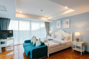 TV a/nebo společenská místnost v ubytování SeaRidge Hua Hin Resort & Poolvilla + 37 fotografií