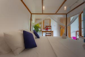 Кровать или кровати в номере Popoyo Surf Resort