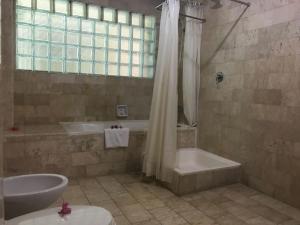 Koupelna v ubytování Melasti Beach Resort & Spa Legian
