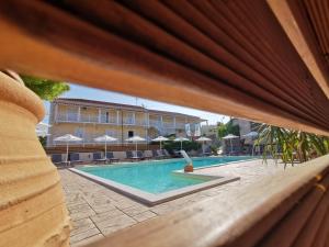 The swimming pool at or close to The Mathraki Studios