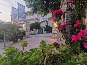 A garden outside The Mathraki Studios