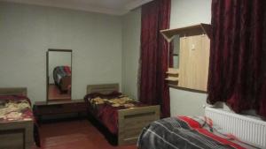Ліжко або ліжка в номері Guest House Adelina