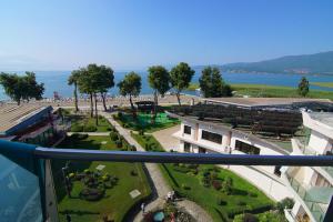 a view from the balcony of a building with a park at Hotel Drim in Struga