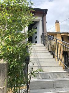 a set of stairs leading to a house at Studio apartman Braco in Risika