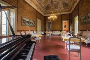 Ein Restaurant oder anderes Speiselokal in der Unterkunft Palazzo Leuzzi B&B 