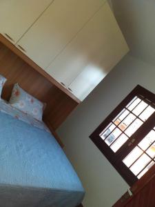 Katil atau katil-katil dalam bilik di Marina House