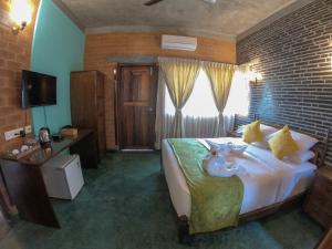 Katil atau katil-katil dalam bilik di Villa Ecotiva