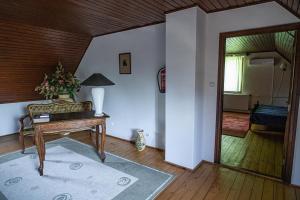 Posteľ alebo postele v izbe v ubytovaní Tusculanum Panzió