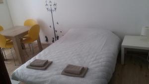 Postel nebo postele na pokoji v ubytování apartman Rijeka