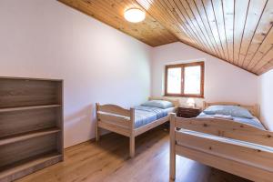 Postel nebo postele na pokoji v ubytování Dolar Rooms + 32 fotografií