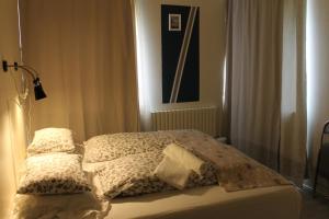 Postel nebo postele na pokoji v ubytování Móra guesthouse