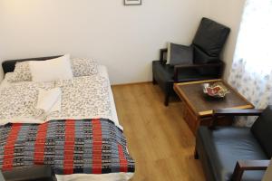 Postel nebo postele na pokoji v ubytování Móra guesthouse