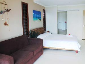 Postel nebo postele na pokoji v ubytování Vanuatu Beachfront Apartments
