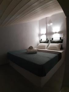 Postel nebo postele na pokoji v ubytování Isalos