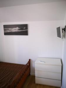 A bed or beds in a room at Appartement Rue Haute des Bains