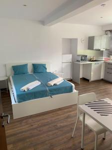 A kitchen or kitchenette at Lilia 4 Self-Check in apartment