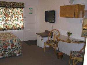 Posezení v ubytování Coachman Motel