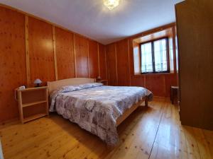 Posteľ alebo postele v izbe v ubytovaní Casa vacanze La Maddalena