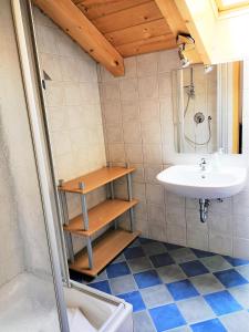 a bathroom with a sink and a toilet and a sink at Smart Chalet Ladis in Ladis