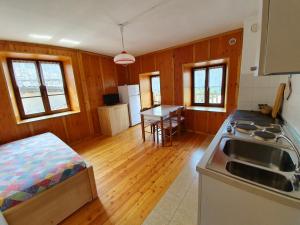 Kuchyňa alebo kuchynka v ubytovaní Casa vacanze La Maddalena