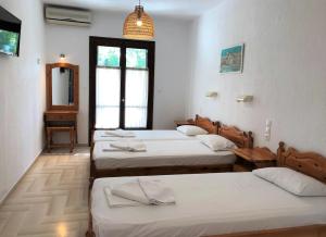 Кровать или кровати в номере Villa Spartias