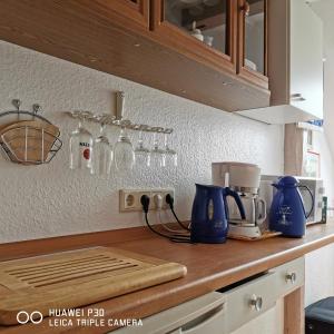 Køkken eller tekøkken på Gästehaus Hemmerdeich-alte Schule